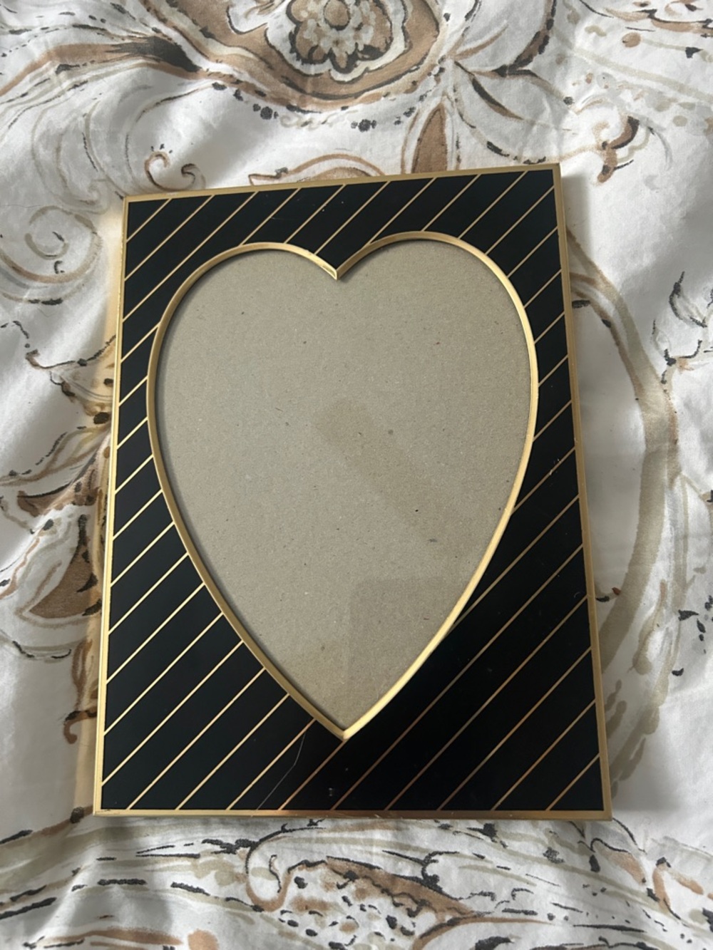 Picture frame black and gold lots of scratches and flaws still beautiful